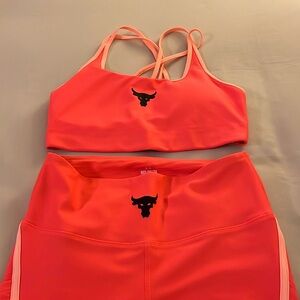 Women’s project rock under armor leggings and matching sports bra. Size medium